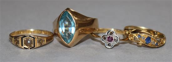 Three 18ct gold gem set rings and one 15ct gold gem set ring.